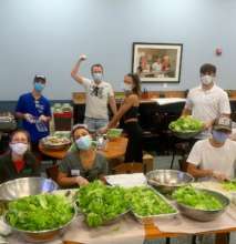 Volunteers Preparing Salads at Local Soup Kitchen