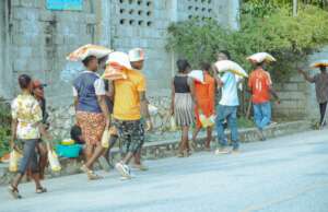 Provide food packages and drinking water in Haiti